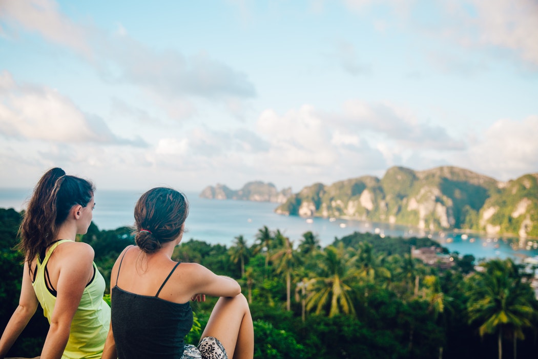 Two women watching sea, Thailand