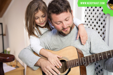 7 Tips For Engaging Students In Music Lessons - Father and daughter playing a guitar